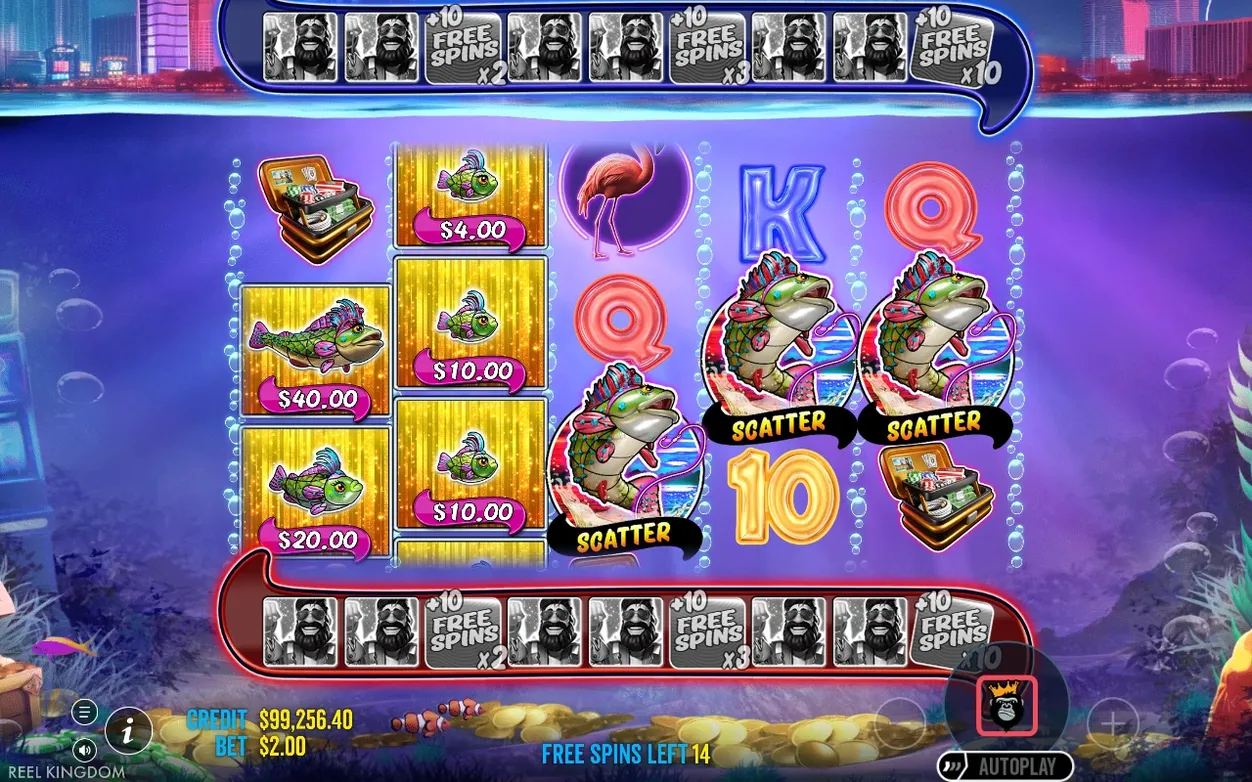 Free spins round shows blue and red collection meters, scatter fish, K and Q symbols, 14 spins left